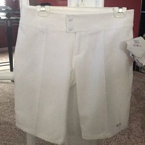 Oakley white golf shorts. Brand new